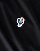Défier oversize T-Shirt with Rooster Patch in black