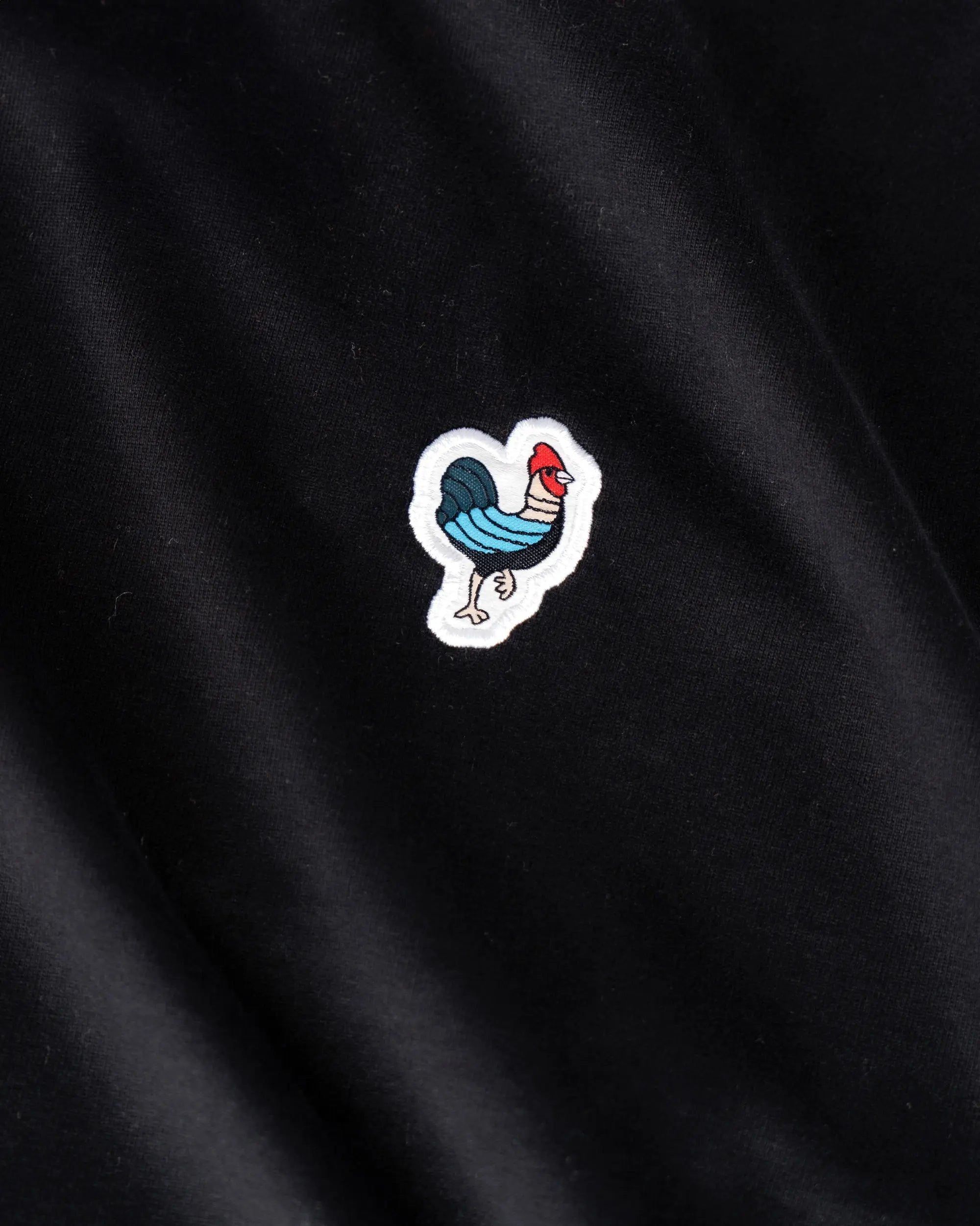 Défier oversize T-Shirt with Rooster Patch in black