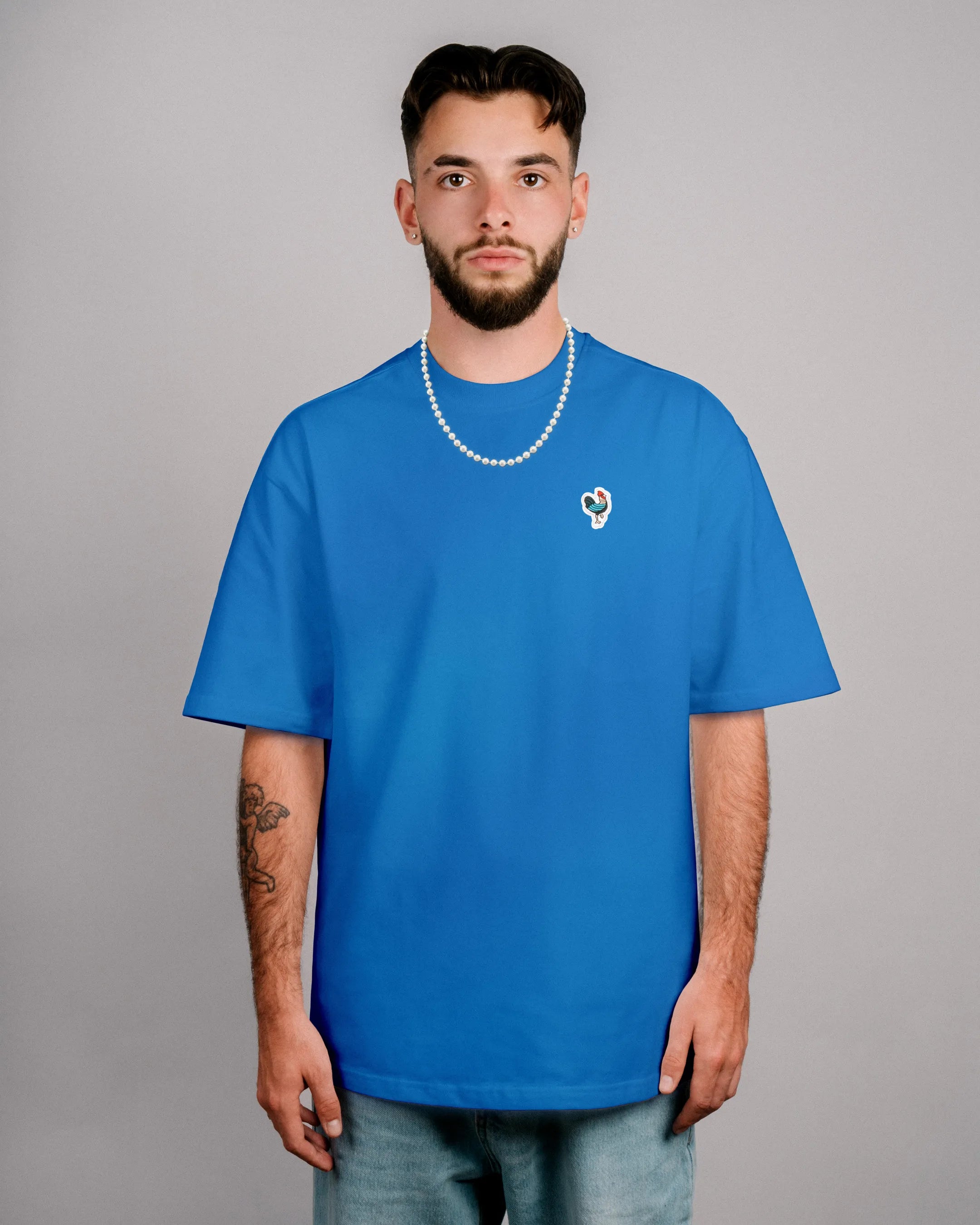 Défier oversize T-Shirt with Rooster Patch in blue