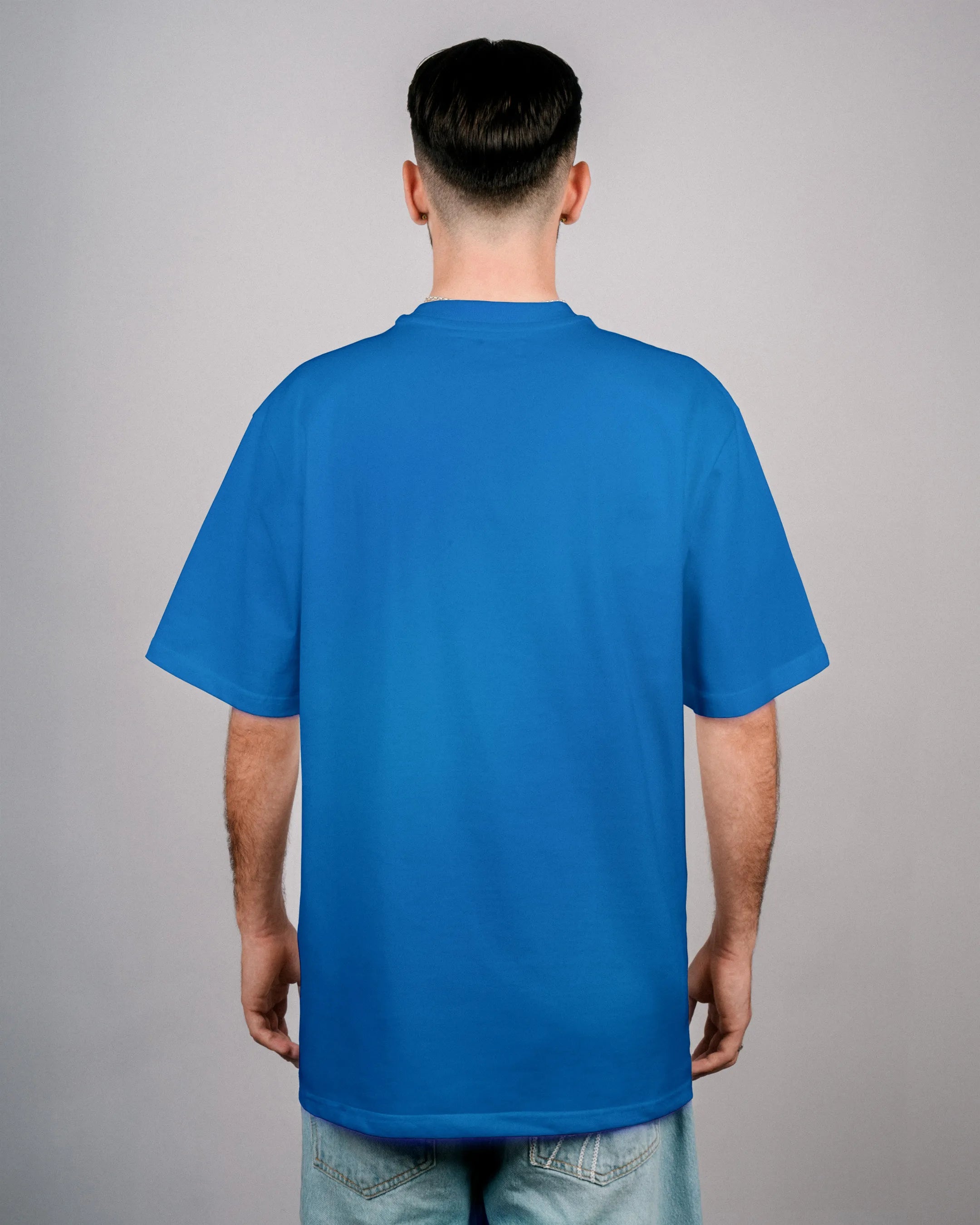 Défier oversize T-Shirt with Rooster Patch in blue