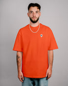 Défier oversize T-Shirt with Rooster Patch in redorange