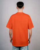 Défier oversize T-Shirt with Rooster Patch in redorange
