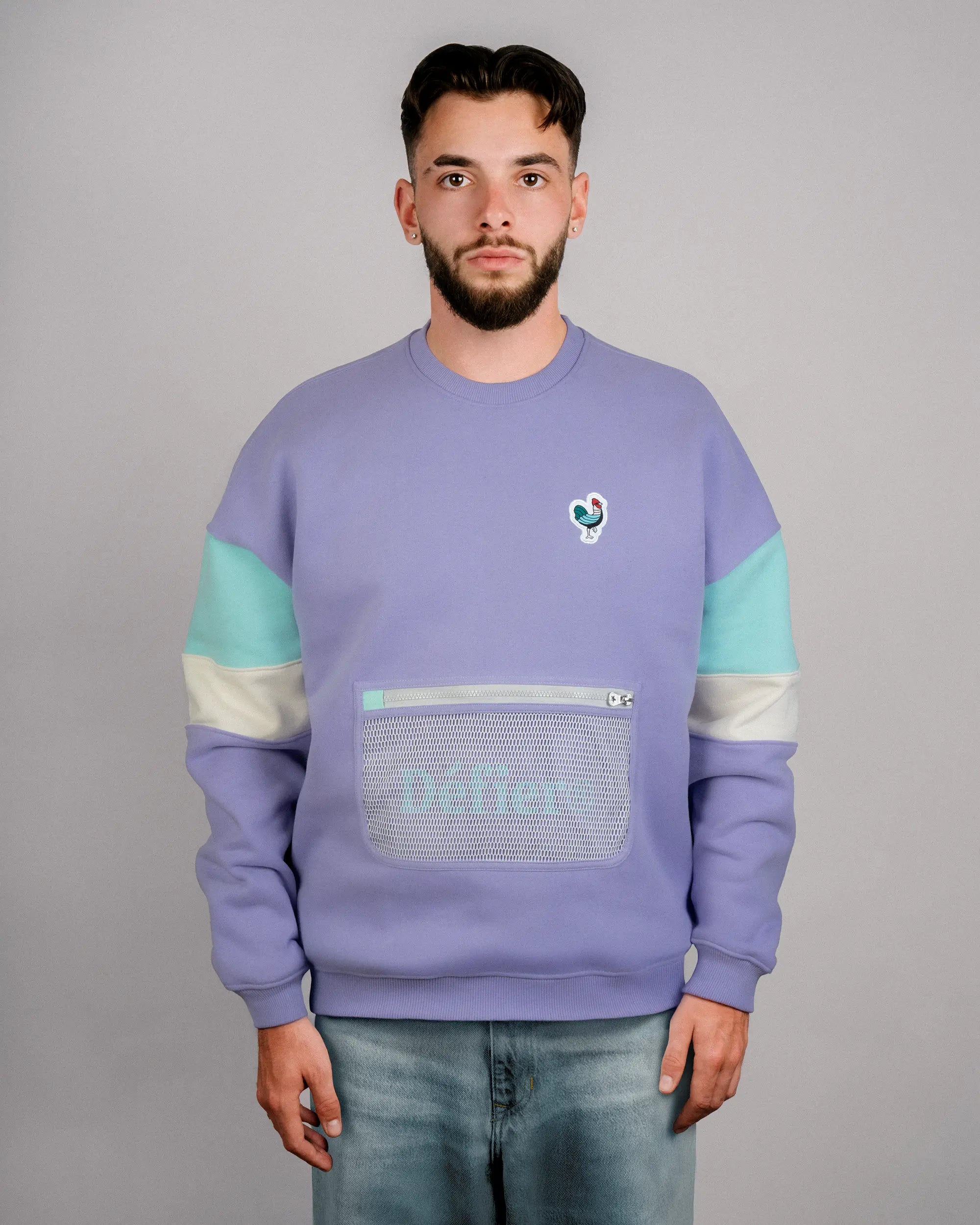 Défier Heritage Crew Neck Sweatshirt with Rooster Patch and Mesh Pocket in purple